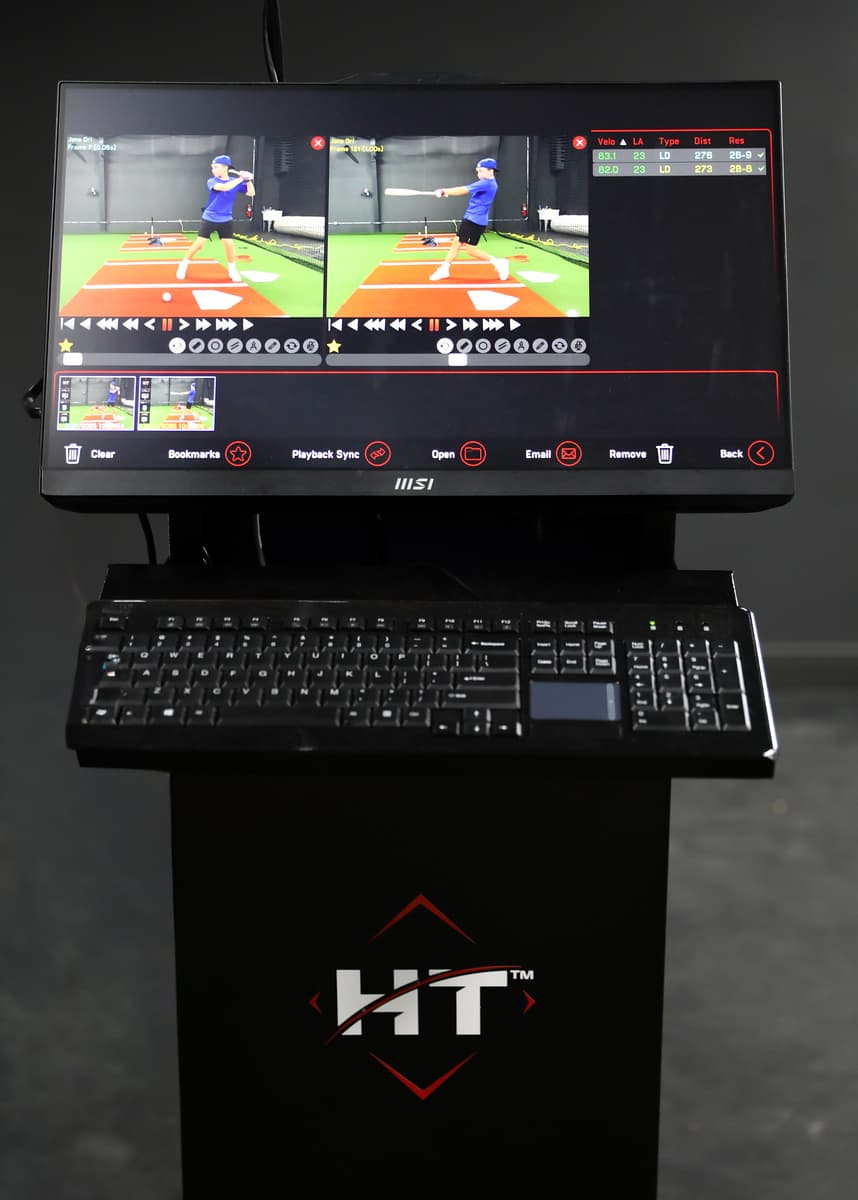 HitTrax cage with batter's box and pro-grade mound