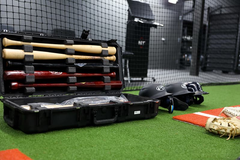 Players rotating through drills with HitTrax feedback